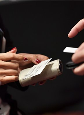 People exchanging business cards at MIPIM Asia